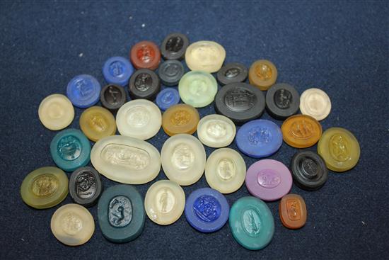 A collection of thirty seven various unmounted hardstone and glass Grand Tour intaglios, largest 1.5in.